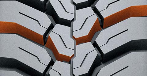 Hankook Smart Work DM09 - Příčné asymetrické drážky.
